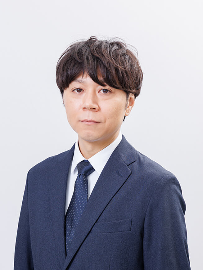 システム担当執行役員 久米 匡史